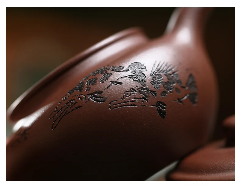Close view of landscape decoration on the teapot