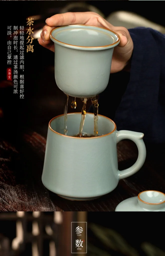Ceramic infuser lifted above the mug to separate tea leaves from liquid